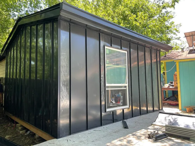 Black standing seam metal wall panels for Metal Roof Installation in Rosemont