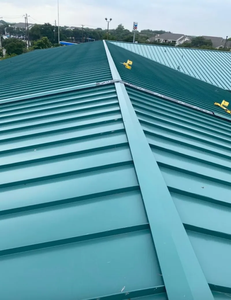 Green commercial metal roof ridge and valley for Metal Roof Repair in Rosemont