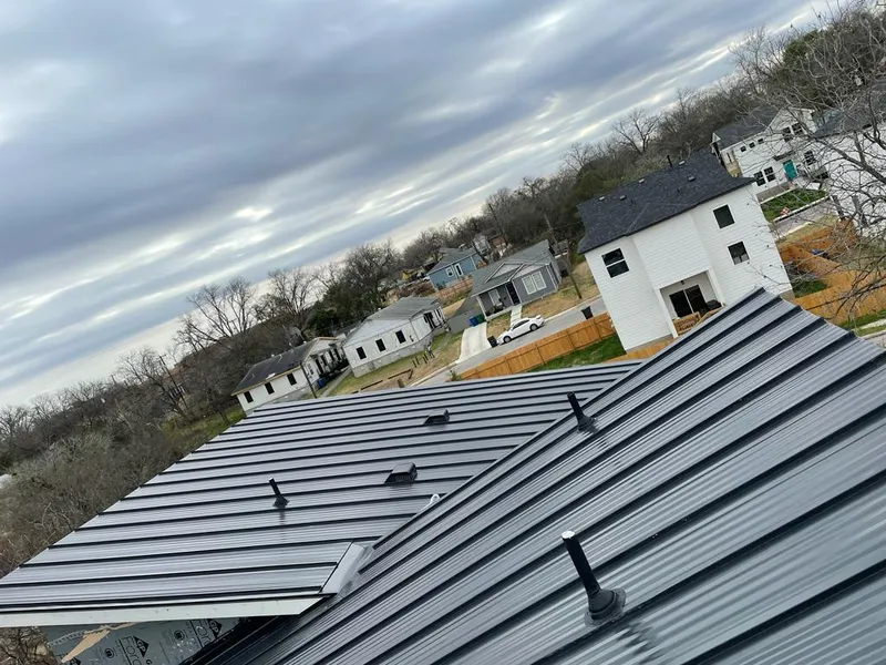 Standing seam metal roof panels with vents for Skylight Repair in Rosemont